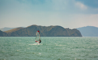 skiing windsurfing in the ocean waves
