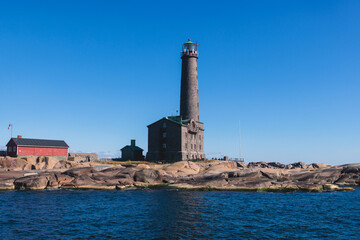 Bengtsk&auml;r Lighthouse, summer view of Bengtskar island in Archipelago Sea, Finland, Kimito&ouml;n, Gulf of Finland sunny day