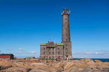 Bengtskär Lighthouse, summer view of Bengtskar island in Archipelago Sea, Finland, Kimitoön, Gulf of Finland sunny day