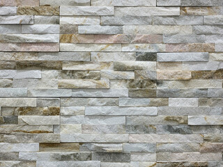 Closeup decorative stone in light beige and gray color.