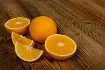 Oranges on a Wooden Table Background