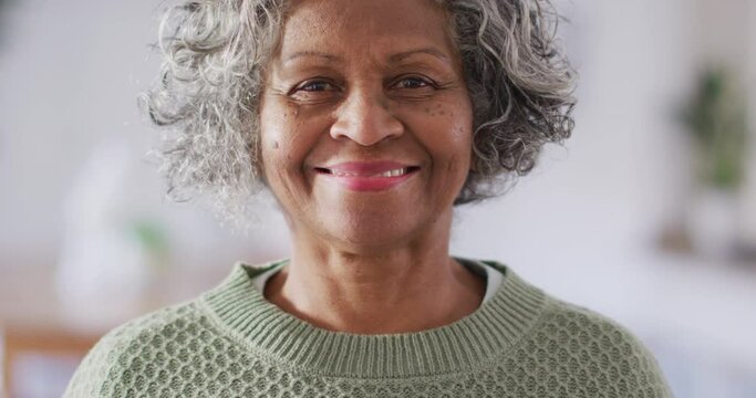 Portrait of happy senior african american woman looking at camera and smiling