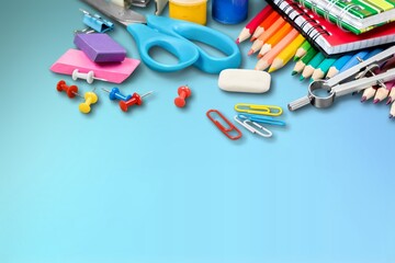 Set of school supplies in different colores on the desk