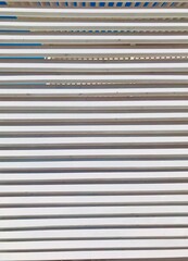 Obraz premium Wooden horizontal blinds. Sun protection. Private cabins. Striped backgrounds. Copy space for text.