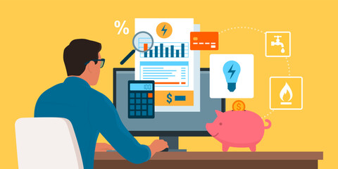 Fototapeta premium Man paying utility bills online
