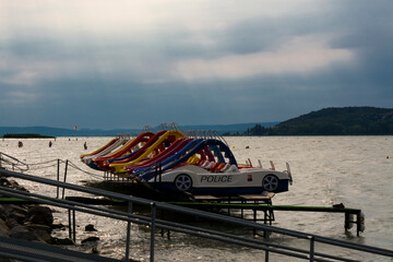 Parking water bikes in the beach of lake Balaton