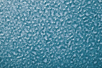 Decorative abstract background. Texture of water drops on glass