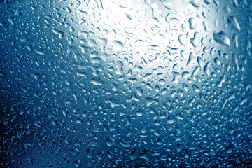 Texture of water drops on glass. Decorative abstract background