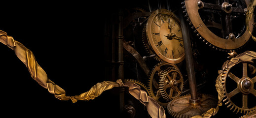 An old antique clock movement and twisting carved frame as a Metaphor for the thread of golden time