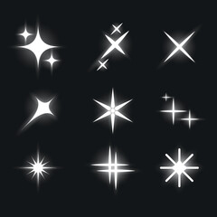 Set of Bright Beautiful Stars. Twinkling Beautiful lights. Vector Graphics.