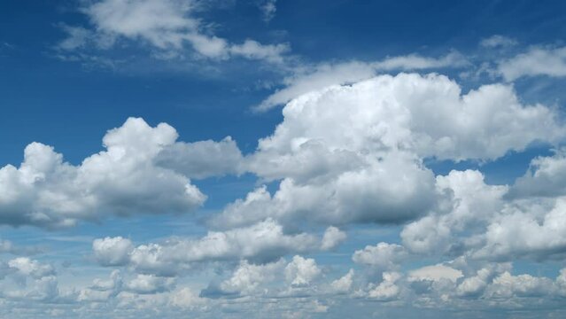 Sky with bautiful silky clouds. Puffy fluffy cumulus and cirrocumulus clouds. Timelapse.