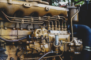 Old yellow engine decorated in vintage style.  