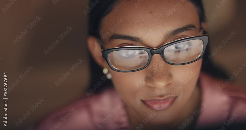 Aufkleber business woman, reflection reading email online on a computer while working late in an office alone.