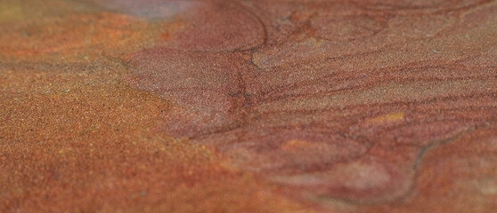 Fluid inks. Multicolor glitter  background. Brown red sand effect