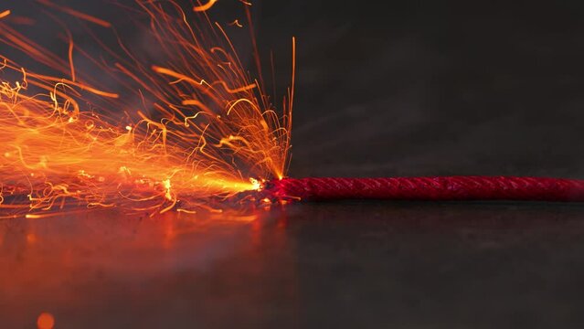 A macro shot of a burning fuse.