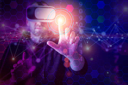 VR technology digital background. Man uses virtual reality glasses and interacts with 3D neon holographic data. Metaverse, futuristic, cyber game concept.