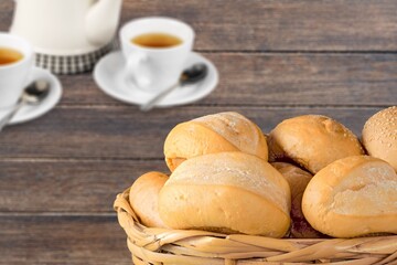Many tasty breads on the wooden desk