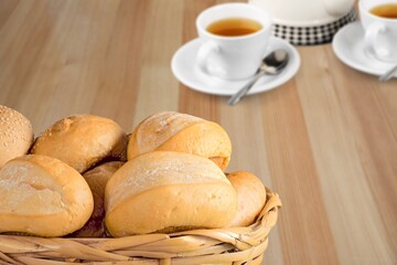 Many tasty breads on the wooden desk