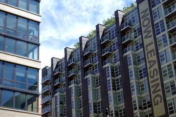 New, modern glass apartment building in urban area