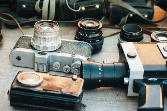 old photo and video equipment. vintage lenses. The flea market sells old cameras, camcorders, lenses and bags