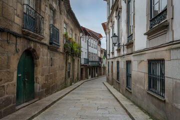 Naklejka na ściany i meble Medieval Santa Maria Street - city oldest street - Guimaraes, Portugal