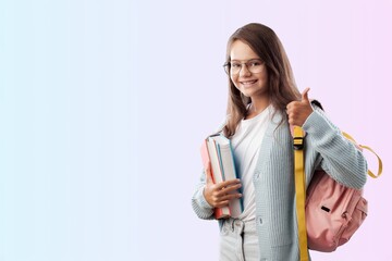 Teenager girl posing on the pastel background