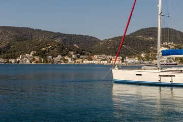 View of the embankment and yachts of the island of Paros (Greece) in a spring evening