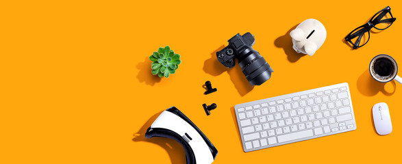 Electronic gadgets and office supplies - flat lay