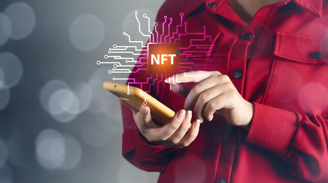 woman holding phone with  nft with network