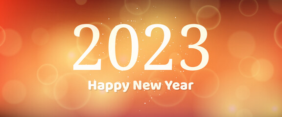 Happy new year 2023 incription on blurred background