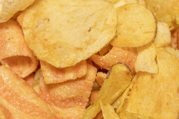 Close-up of fried foods. potatoes, plantains and bacon