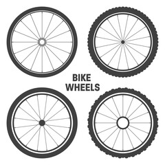 Fototapeta premium Black bicycle wheel symbols collection. Bike rubber tyre silhouettes. Fitness cycle, road and mountain bike. Vector illustration.