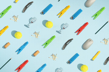 pattern of tenis ball mause cork pencil wine glass stirrup match lighter and wine opener.minimal crearive composition