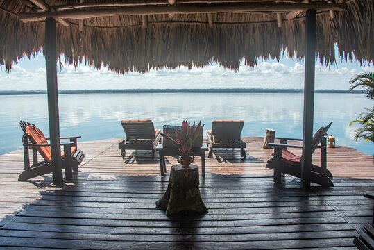 Dock and palapa hut on beautiful Lake Peten Itza, El Remate, Petén, Guatemala