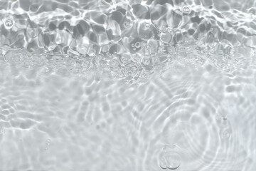Transparent clear calm water surface texture with waves, splashes and bubbles. Trendy abstract...