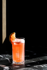 Picture of grapefruit garibaldi cocktail in a highball glass