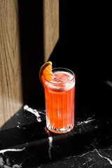 Picture of grapefruit garibaldi cocktail in a highball glass