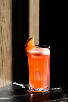 Picture of grapefruit garibaldi cocktail in a highball glass