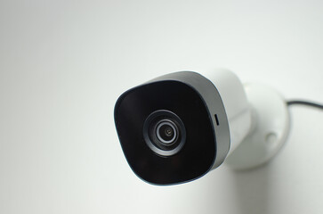 CCTV videocam, CFTV security camera, white camera with secure circuit, theft protection....