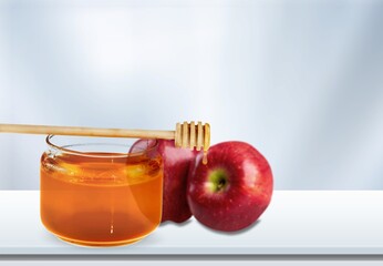 Fresh ripe Apples and honey in the jar