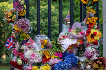 Flowers of rememberance tied to railing in London, United Kingdom 