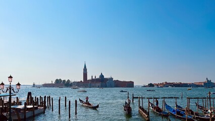 Gondolas in Venice, near Piazza San Marco, in the distance the Church of San Giorgio Maggiore