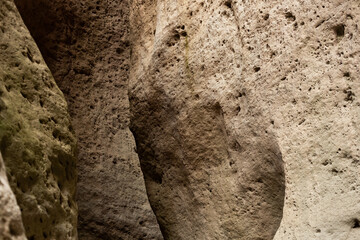 Karadakh Gorge in Dagestan, Russia. Limestone rocks in sunlight. Abstract natural background. Limestone walls close up. Travel concept
