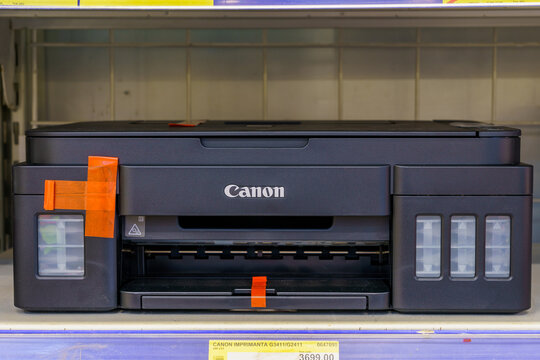 Canon office printer on a store shelf. Illustrative editorial. February 2, 2022 Beltsy Moldova