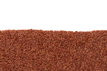 close-up texture of raw red rice with copy space for text.