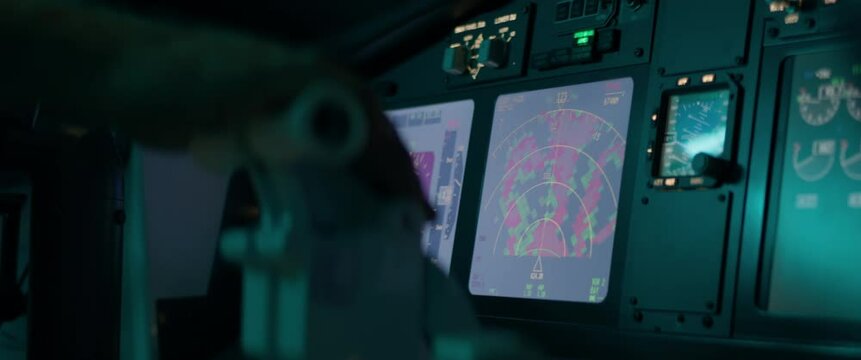 CU on airplane weather radar screen inside the cockpit, aircraft going through thunderstorm rain clouds, heavy turbulence