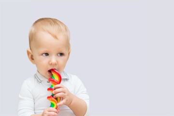 Baby child eating tasty sweets food