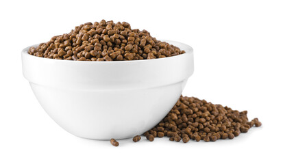 Bowl with buckwheat tea granules on white background