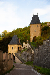 Fototapeta na wymiar Karlstejn castle towers. Gothic castle founded 1348 CE by Charles IV. Czech Republic