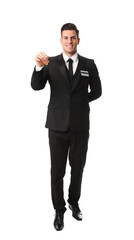 Happy receptionist in uniform holding key on white background